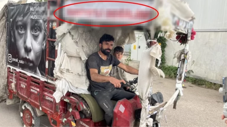 Saldırıya uğramaktan korkan kağıt toplayıcısı motosikletine “Suriyeli değilim” yazdı